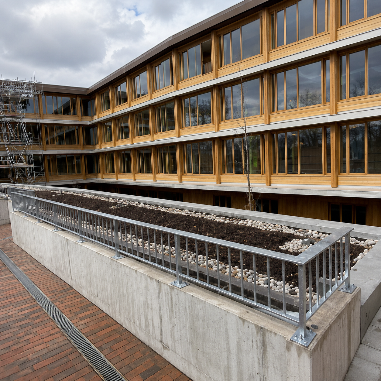 A completed timber-framed development with landscaped courtyard